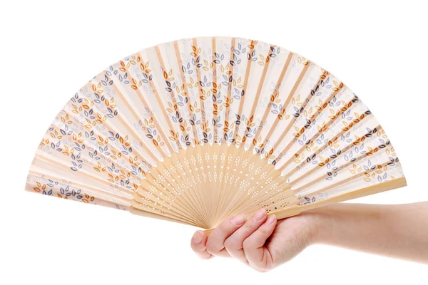 Hand holding folding fan — Stock Photo, Image
