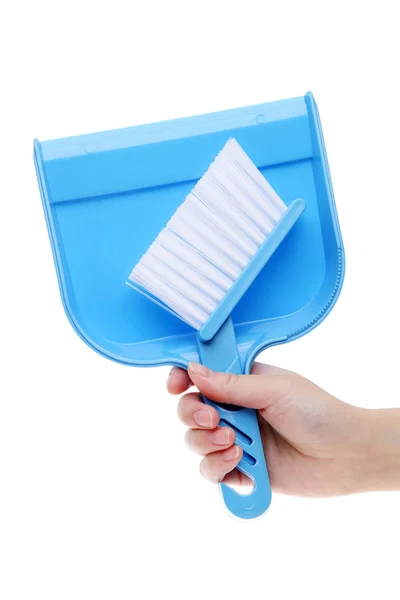 Hand holding dustpan — Stock Photo, Image