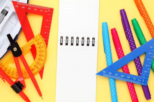 Multicolored pen, rulers and notebook — Stock Photo, Image
