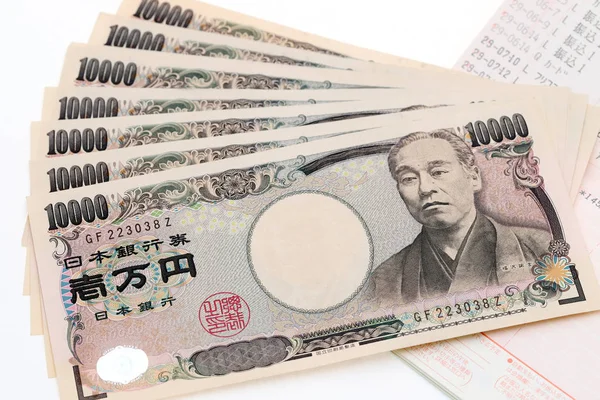 Dinheiro japonês e livro bancário — Fotografia de Stock