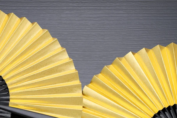 golden folding fan