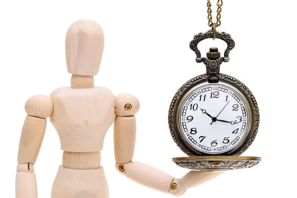 Wooden model dummy holding old clock watch — Stock Photo, Image