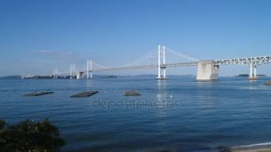 Uçuş, hava uçak önceden yer sakin, mavi deniz, Seto Köprüsü