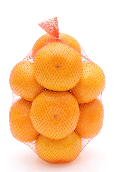 Agrumi Giapponesi Mikan Frutta Sacchetto Plastica Mesh Sfondo Bianco — Foto Stock