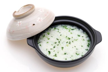 Japanese food, Nanakusagayu in a donabe bowl on white background  clipart