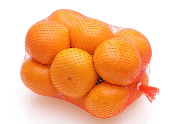 Agrumes Japonais Mikan Fruits Dans Sac Plastique Sur Fond Blanc — Photo