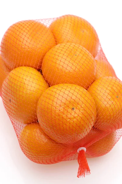 Japanische Zitrusfrüchte Mikan Einer Plastiktüte Auf Weißem Hintergrund — Stockfoto