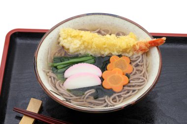Japanese Tenpura soba noodles in a bowl with chopsticks on tray clipart