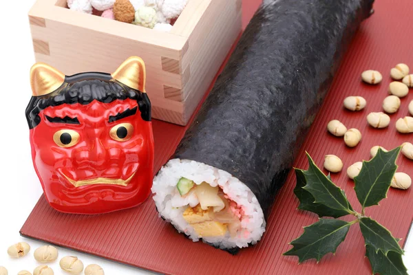 Japanese traditional Setsubun event, Masks of Oni demon and ehomaki sushi are used on an annual event