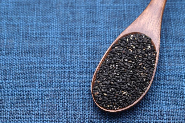 Black Sesame Seeds Wooden Spoon Table — Stock Photo, Image