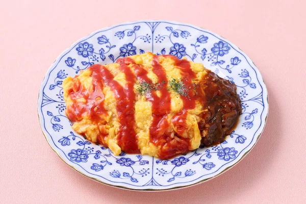 Japanese food, Omuraise with ketchup in a plate on table
