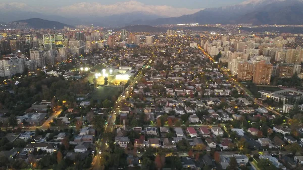 Aerial view of sunset and city lights in Santiago, Chile — Stock Photo, Image
