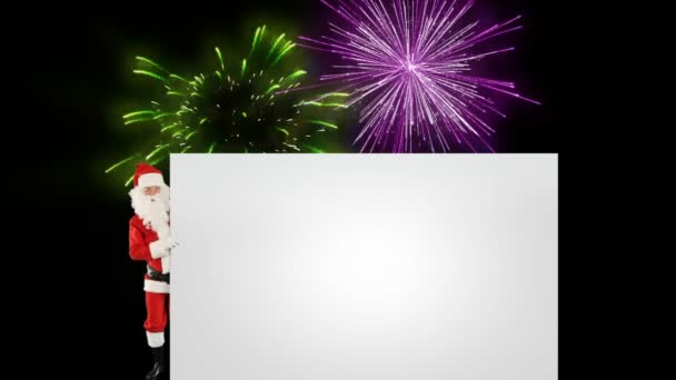 Santa Claus appears behind a wall with space for text with holiday fireworks display — Stock Video