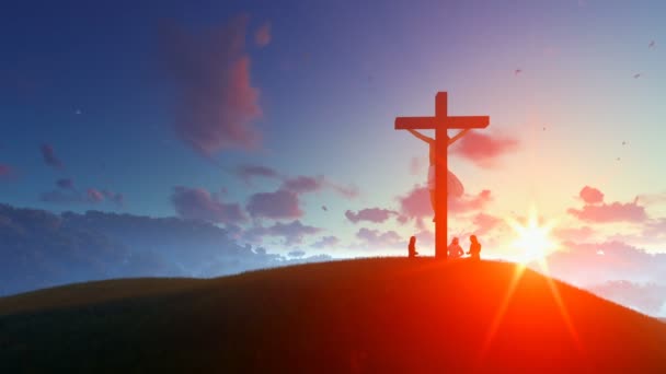 Ježíš na kříži proti východu slunce, věřící se modlí — Stock video