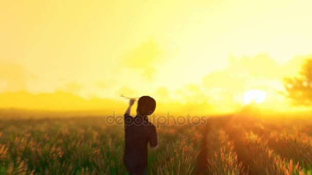 Little boy running on wheat grass crop, old windmill in the background at sunrise, sunny mist — Stok Video