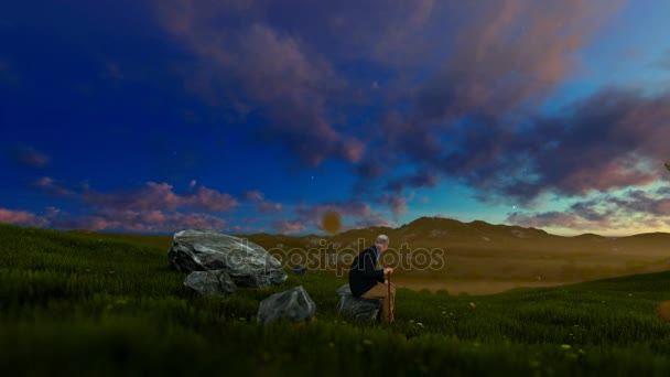 Grandfather resting on green meadow at sunrise, panning — Stock Video