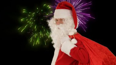Noel Baba bir KIS ve dalga, tatil havai fişek karşı gönderir
