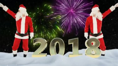 Noel Baba dans ve 2018 işareti, havai fişek ve kar