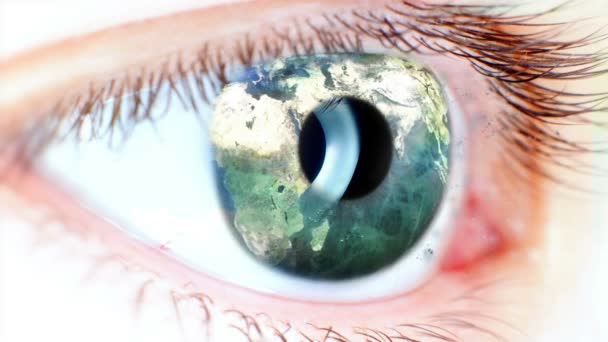 Голубой глаз с карты земли на Ирис и летающих частиц — стоковое видео