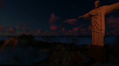 İsa'nın kurtarıcı gün batımında, Rio de Janeiro, bulutların üzerinde hava