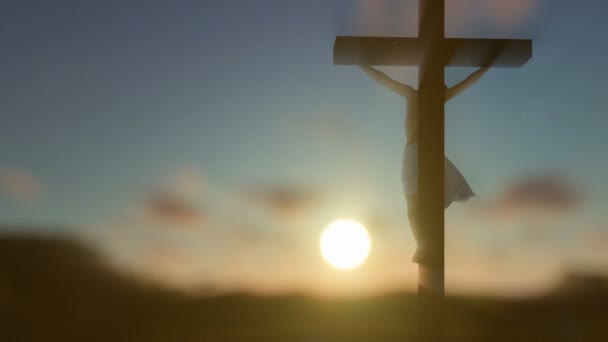 Jezus Kruis tegen wazig sunrise, uitzoomen — Stockvideo