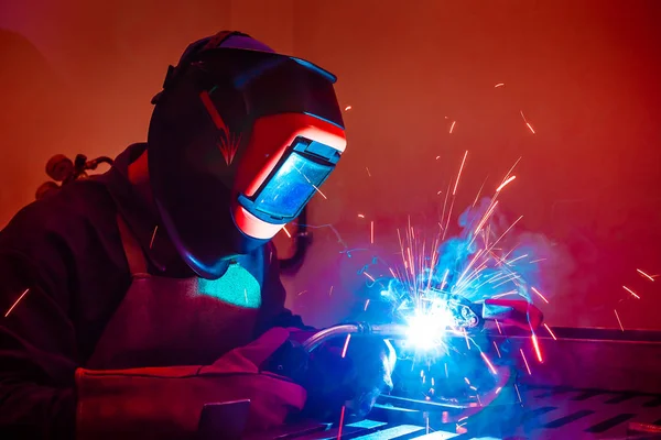 Welding in red room — Stock Photo, Image