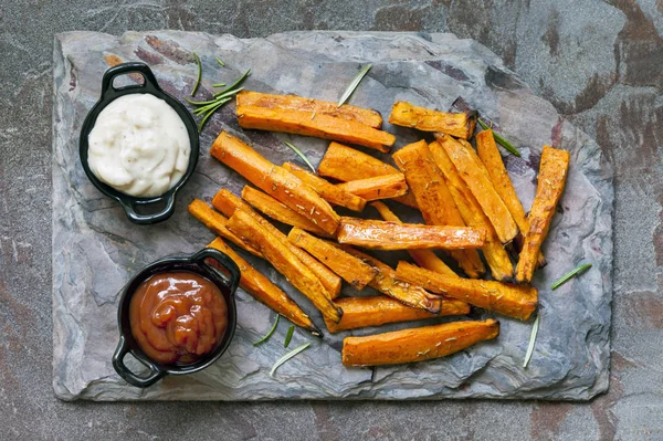 Sweet Potato Fries Top View on Slate with Ketchup and Mayonnaise — Stock Photo, Image