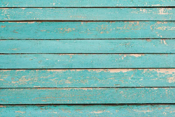 Fond en bois, fragment du mur d'une vieille maison en bois peint en turquoise — Photo