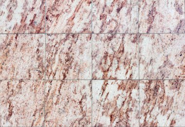 Kahverengi taştan dekoratif fayanslar, arka plan. Taş kiremitlerin dokusu..