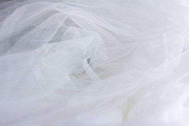 Tulle, kumaş, beyaz tül. Kumaşın dokusu, tülün dokusu, yumuşak beyaz madde. Kapalı tül..
