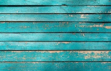 Mavi ahşap arka plan. Mavi boyalı, çatallı ve tırnaklı eski ahşap bir duvar..