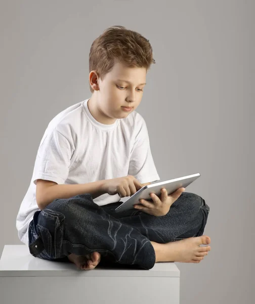 Beauty boy with tablet PC — Stock Photo, Image