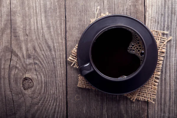 Kopje espresso koffie op oude houten tafel vintage — Stockfoto