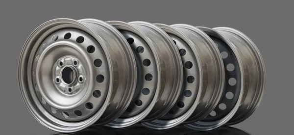 4 Cerchio ruota in acciaio su sfondo grigio — Foto Stock