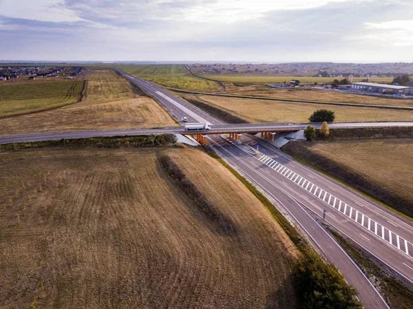 Aerial Top View of highway intersection junction summer morning — Stock Photo, Image