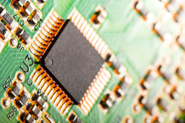 Computer processor chip on a circuit board with microchips and o — Stock Photo, Image