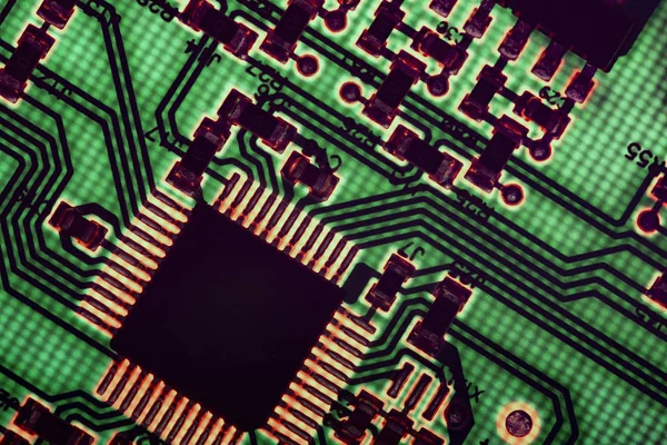 computer processor chip on a circuit board with microchips and o