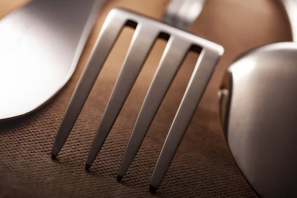 Silverware on white table — Stock Photo, Image