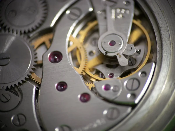 Meccanismo a orologeria del vecchio orologio d'epoca. macro scatto — Foto Stock