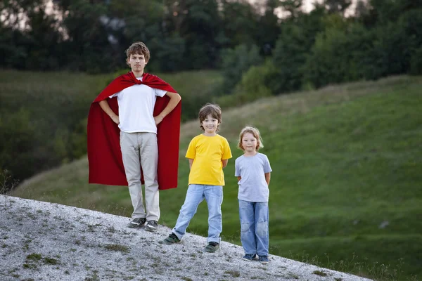 Boys Playing Superheroes Outdoors Teenage Superhero Red Cloak Hill — Stock fotografie