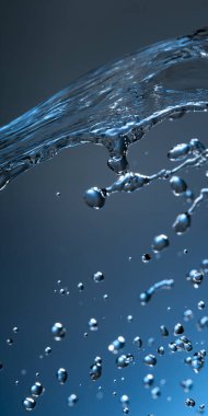 soyut damla su sıçrama mavi zemin üzerine.