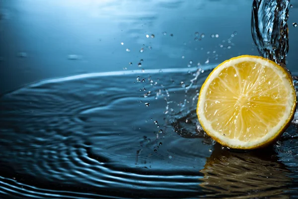 Orange Fruit Slice Water Splash Stream Stock Picture