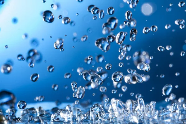 Abstrato Gota Respingo Água Fundo Azul — Fotografia de Stock