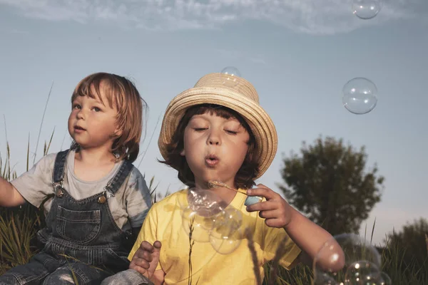 Happy Boy Play Bubbles Field Sunny Summer Day — Stock Photo, Image