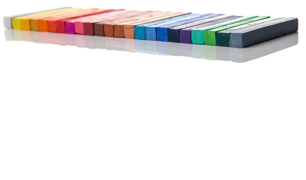 Různé barvy pastelové křídy hole — Stock fotografie