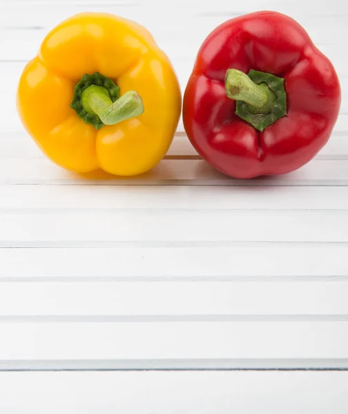 Red and yellow capsicum or bell pepper — Stock Photo, Image