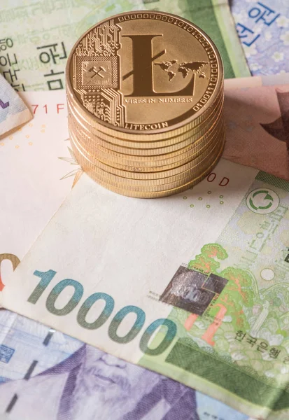 Litecoin cryptocurrency on South Korean bank notes