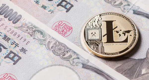 日本円紙幣の Litecoin Cryptocurrency — ストック写真