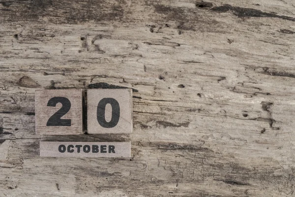 Cube calendar for october on wooden background with copy space — Stock Photo, Image