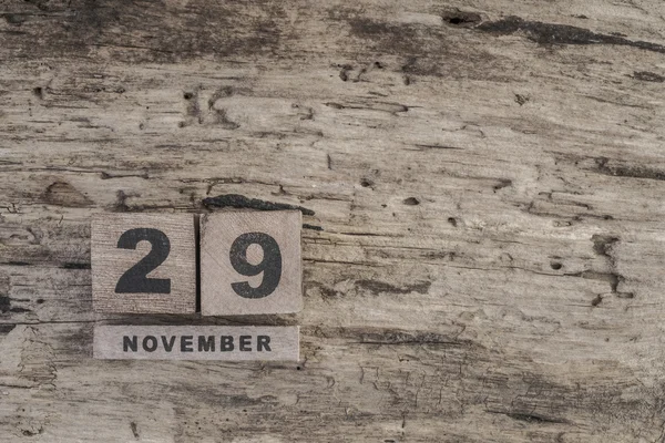 Calendario de cubo para noviembre sobre fondo de madera con espacio de copia — Foto de Stock